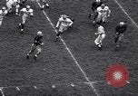 Immagine di Partita di calcio Iowa City Iowa USA, 1956, secondo 21 filmato di repertorio 65675036668