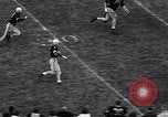Immagine di Partita di calcio Iowa City Iowa USA, 1956, secondo 24 filmato di repertorio 65675036668