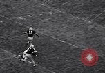 Immagine di Partita di calcio Iowa City Iowa USA, 1956, secondo 28 filmato di repertorio 65675036668