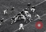 Immagine di Partita di calcio Iowa City Iowa USA, 1956, secondo 35 filmato di repertorio 65675036668