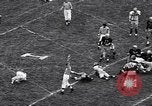 Immagine di Partita di calcio Iowa City Iowa USA, 1956, secondo 38 filmato di repertorio 65675036668
