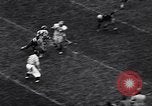 Immagine di Partita di calcio Iowa City Iowa USA, 1956, secondo 47 filmato di repertorio 65675036668