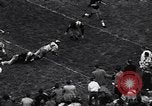 Immagine di Partita di calcio Iowa City Iowa USA, 1956, secondo 48 filmato di repertorio 65675036668