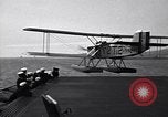 Image of T3M-2 floatplane on USS Saratoga CV-3 Pacific Ocean, 1929, second 18 stock footage video 65675036683