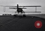 Image of T3M-2 floatplane on USS Saratoga CV-3 Pacific Ocean, 1929, second 53 stock footage video 65675036683