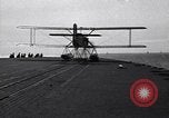 Image of T3M-2 floatplane on USS Saratoga CV-3 Pacific Ocean, 1929, second 55 stock footage video 65675036683