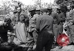 Image of German officer surrenders to British officers Ivrea Italy, 1945, second 25 stock footage video 65675036694