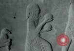 Image of native man leads camel herd Iran, 1908, second 25 stock footage video 65675036728