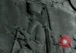 Image of native man leads camel herd Iran, 1908, second 26 stock footage video 65675036728