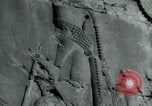 Image of native man leads camel herd Iran, 1908, second 28 stock footage video 65675036728