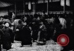 Image of presentation by school children Japan, 1900, second 1 stock footage video 65675036776