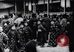Image of presentation by school children Japan, 1900, second 7 stock footage video 65675036776