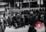 Image of presentation by school children Japan, 1900, second 16 stock footage video 65675036776