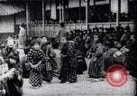 Image of presentation by school children Japan, 1900, second 17 stock footage video 65675036776