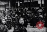 Image of presentation by school children Japan, 1900, second 23 stock footage video 65675036776
