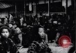 Image of presentation by school children Japan, 1900, second 26 stock footage video 65675036776