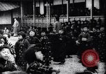 Image of presentation by school children Japan, 1900, second 31 stock footage video 65675036776