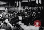 Image of presentation by school children Japan, 1900, second 32 stock footage video 65675036776