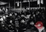 Image of presentation by school children Japan, 1900, second 37 stock footage video 65675036776