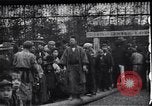 Image of man stands on wooden log Japan, 1900, second 1 stock footage video 65675036777
