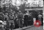 Image of man stands on wooden log Japan, 1900, second 5 stock footage video 65675036777