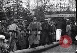 Image of man stands on wooden log Japan, 1900, second 7 stock footage video 65675036777