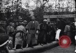 Image of man stands on wooden log Japan, 1900, second 10 stock footage video 65675036777