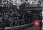 Image of man stands on wooden log Japan, 1900, second 13 stock footage video 65675036777