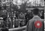 Image of man stands on wooden log Japan, 1900, second 16 stock footage video 65675036777
