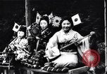 Image of women dance and play music Japan, 1900, second 5 stock footage video 65675036779