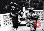 Image of women dance and play music Japan, 1900, second 16 stock footage video 65675036779