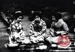 Image of women dance and play music Japan, 1900, second 52 stock footage video 65675036779