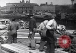 Image of immigrants working in America United States USA, 1910, second 5 stock footage video 65675036801