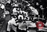 Image of Workers in clothing factory Chicago United States USA, 1910, second 18 stock footage video 65675036803