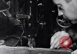 Image of Workers in clothing factory Chicago United States USA, 1910, second 52 stock footage video 65675036803