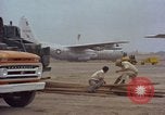 Image of Andes Airlift of construction equipment Chiloya Peru, 1966, second 41 stock footage video 65675036927