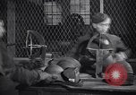 Image of helmet manufacturing factory Florence Italy, 1939, second 22 stock footage video 65675036949