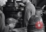 Image of helmet manufacturing factory Florence Italy, 1939, second 37 stock footage video 65675036949