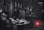 Image of helmet manufacturing factory Florence Italy, 1939, second 44 stock footage video 65675036949