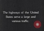 Image of 1930s automobiles and roadways in America United States USA, 1932, second 11 stock footage video 65675036975