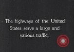 Image of 1930s automobiles and roadways in America United States USA, 1932, second 13 stock footage video 65675036975