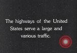 Image of 1930s automobiles and roadways in America United States USA, 1932, second 17 stock footage video 65675036975