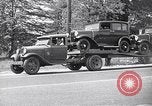 Image of 1930s automobiles and roadways in America United States USA, 1932, second 49 stock footage video 65675036975