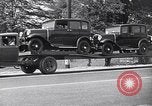 Image of 1930s automobiles and roadways in America United States USA, 1932, second 51 stock footage video 65675036975