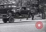 Image of 1930s automobiles and roadways in America United States USA, 1932, second 54 stock footage video 65675036975