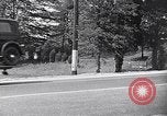 Image of 1930s automobiles and roadways in America United States USA, 1932, second 55 stock footage video 65675036975