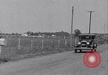 Image of Farmer in 1929 Ford Model A Tudor United States USA, 1930, second 6 stock footage video 65675036976