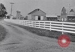 Image of Farmer in 1929 Ford Model A Tudor United States USA, 1930, second 16 stock footage video 65675036976