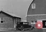 Image of Farmer in 1929 Ford Model A Tudor United States USA, 1930, second 18 stock footage video 65675036976