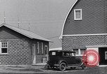 Image of Farmer in 1929 Ford Model A Tudor United States USA, 1930, second 19 stock footage video 65675036976